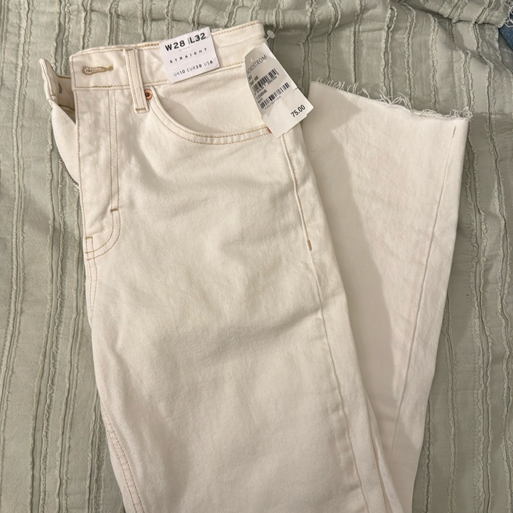 White Top Shop jeans, never worn with tags attached.